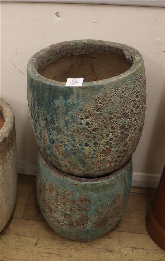 A pair of Atlantis garden planters H.56cm